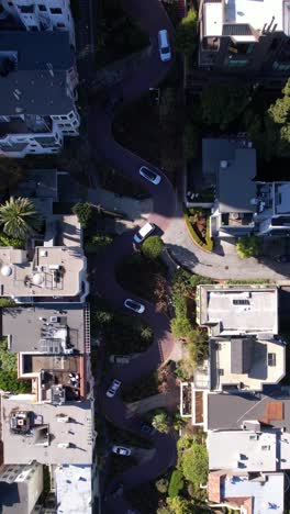 Vertical-Drone-Shot,-Lombard-Street-Curves-and-Cars,-Famous-Location-in-San-Francisco,-California-USA