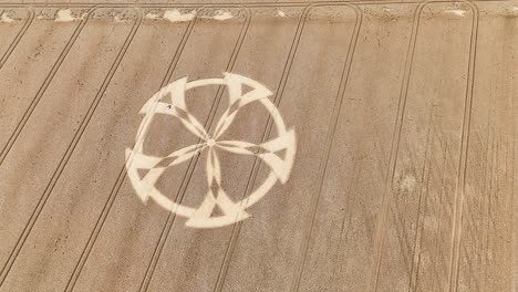 Badbury-rings-crop-circle-aerial-view-over-elaborate-geometric-patterns-on-Dorset-Agricultural-wheat-field