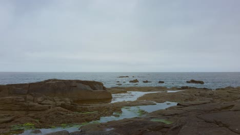 Rocky-coastline-with-the-ocean-in-the-distance