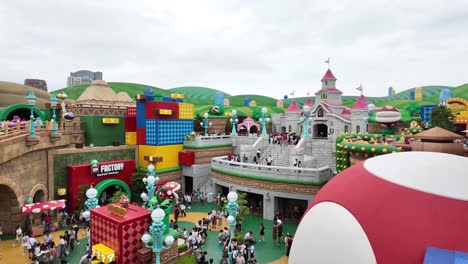 Panoramic-view-of-Super-Nintendo-World-vibrant-attractions-and-themed-areas-at-Universal-Studios-Japan