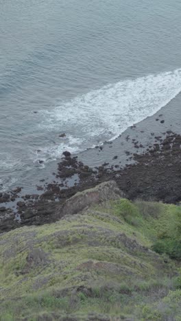 Experience-the-mesmerizing-patterns-of-ocean-waves-from-an-aerial-perspective,-capturing-their-dynamic-motion-and-rhythm