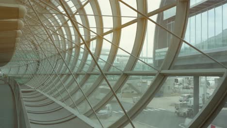 Close-up-of-round-window-front-at-paris-airport-without-people