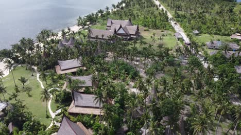 Nay-Palad-Luxury-Island-Resort-on-Tropical-White-Sand-Beach,-Aerial-Drone-Shot