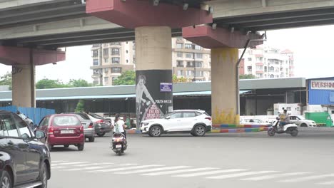 signal-is-open-showing-a-lot-of-traffic-under-the-bridge-and-a-lot-of-people-going-to-work