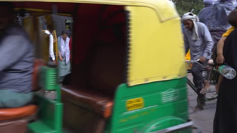 Busy-congested-streets-of-famous-tourist-destination-Red-Fort-in-Chandni-Chowk,-North-Delhi-Police-barricades