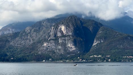 Mountains-around-Lake-Como-Alps-region,-speed-boat-ride-in-Italy