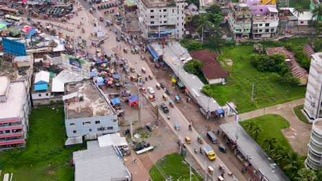 Wide-Aerial-Drone-Shot-of-a-Crowded-Street-in-Barisal-City-in-Bangladesh