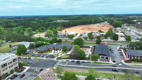 Shopping-Mall-and-highway-with-cars-in-suburb-district-of-Georgia