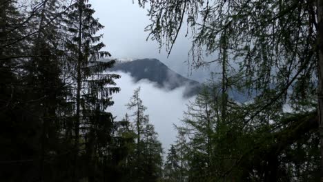 4K-shot-of-snowcapped-Swiss-Alps-on-an-overcast-spring-day