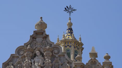 An-intricate-facade-in-Balboa-Park-showcases-the-park's-rich-architectural-heritage,-blending-artistry-and-history-in-one-of-San-Diego's-most-iconic-cultural-landmarks