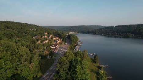 long-drone-descent-lake-to-boat-docks-Depp-Creek-Lake-Maryland-sunny-summer-morning