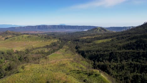 Aerial-view-of-idyllic-landscape-in-nature-with-mountains-in-the-distance