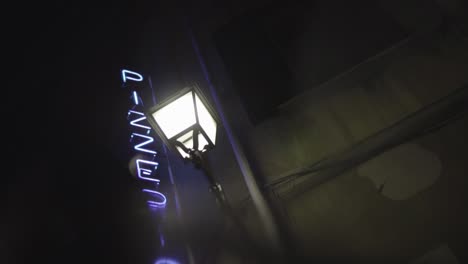 Slow-Motion:-Bright-itlalian-Pizzeria-sign-at-night-with-shiny-letters