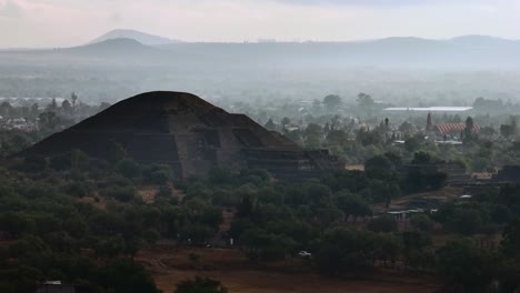 Morning-mist-surrounds-the-Pyramid-of-the-Moon,-Teotihuacan,-Mexico,-Aztec-ancient-city