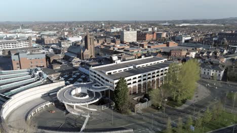 Suburban-UK-town-corona-Covid-lock-down-quarantine-aerial-views-rising-above-horizon