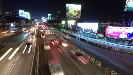 Timelapse-view-of-vehicles-driving-through-opposite-direction-highway-at-night-in-rush-hour-at-Carlos-P