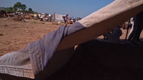 Back-view-of-Rajasthani-men-resting-in-a-tent