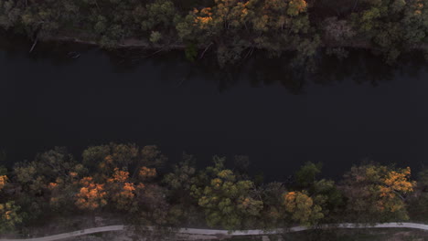 Aerial-top-down-flying-along-the-Murrumbidgee-River-at-sunrise-in-the-rural-city-of-Wagga-Wagga-New-South-Wales-Australia