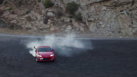 Muscle-and-sports-cars-doing-doughnuts-and-burnouts-with-a-car-club-in-the-Angeles-National-Forest-in-Southern-California