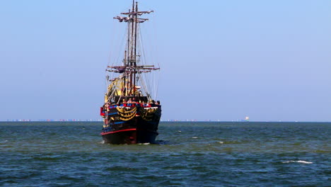 Pirate-boat-sailing-on-the-sea,-Wide-shot-with-copy-space,-Sopot,-Poland