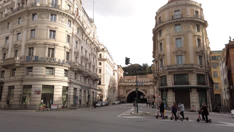 Empty-Streets-in-the-city-centre-of-Rome-due-to-the-covid-crisis,-the-very-few-tourists-can-enjoy-riding-e-scooters-without-the-usual-intense-traffic