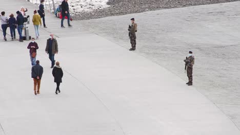 Soldiers-with-face-mask-and-rifles-guarding-Mont-St