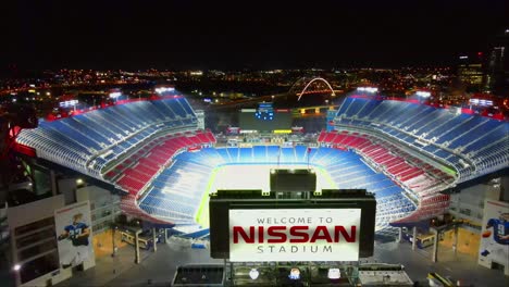 Aerial-fly-through-of-Nissan-Stadium-at-night