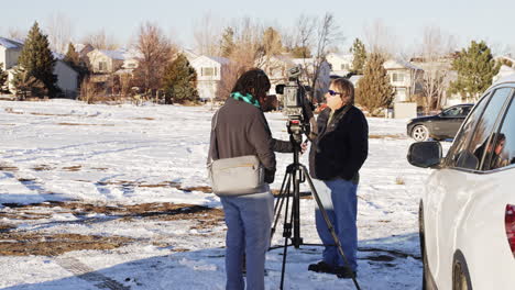 Civilian-Being-Interviewed-By-News-Reporter-In-Superior-Colorado-Boulder-County-USA-After-Marshall-Fire-Wildfire-Disaster