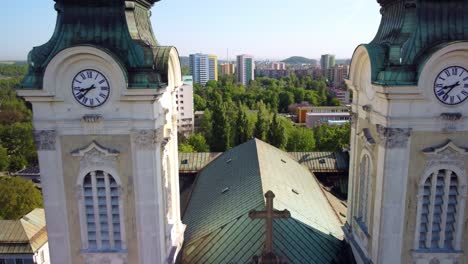 Historical-Roman-Catholic-parish-church,-Nativity-Panny-Marie-Královny,-Ostrava,-Czech-Republic-aerial,-pull-back-shot