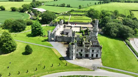 Ireland-Epic-Locations-drone-flyover-od-ruined-stately-home-Duckeyys-Castle-Carlow-in-Ireland-on-a-perfect-summer-day