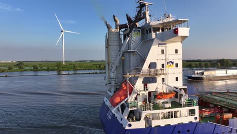 Aerial-pan-of-container-ship-BG-Onyx-on-still-water-in-the-Netherlands