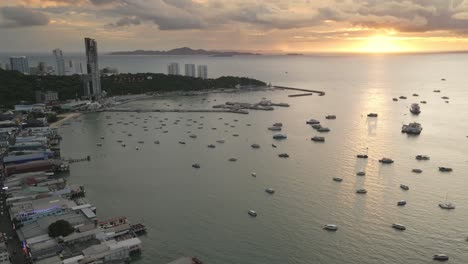 Pattaya-Beach,-Aerial-Drone-reveals-sunset-reflection-on-Thai-Famous-travel-spot-natural-location