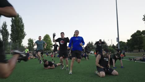 Men-doing-physical-and-recreational-activities-on-a-soccer-field-in-the-morning