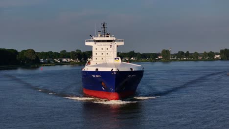 BG-Onyx-cargo-ship-on-water-in-Netherlands,-frontal-aerial-push-in