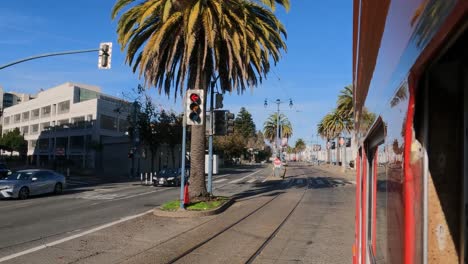 San-Francisco,-California-USA,-Riding-on-Bus-on-Historic-The-Embarcadero-Waterfront-Roadway,-Out-of-Window-POV