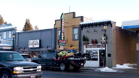 A-snowy-winters-day-during-Christmas-holiday-season-on-a-scenic-street-in-town-of-McCall,-Idaho-USA