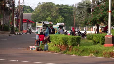 food-seller-on-the-side-of-road,-Semarang,-Central-Java,-Indoensia-on-JUne-10,-2022