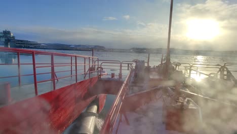 Looking-Through-Frosty-Window-At-Forward-Bow-Of-Garinko-II-Cruise-Ship-Going-Across-Sea-Drift-Ice-Off-Hokkaido-During-Sunset