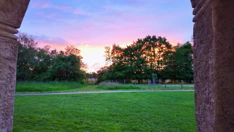 Following-movement-from-the-beautiful-sunset-at-the-garden-of-Museum-Robert-Tatin,-Mayenne,-France