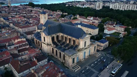 Middle-altitude-aerial-movement-about-the-Cathedral-Saint-Louis,-La-Rochelle,-France