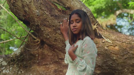 A-girl-with-curly-hair-spends-a-delightful-day-in-a-tropical-park-under-the-sun