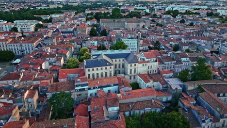 High-altitude-aerial-movement-near-the-La-Rochelle-Cathedral,-La-Rochelle,-France