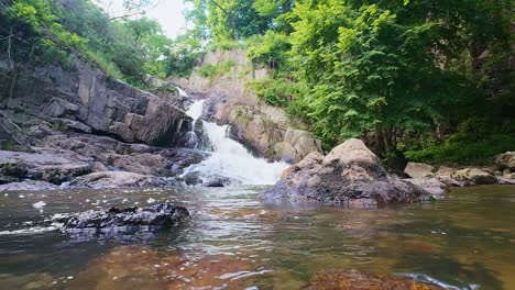 Downward-movement-and-inside-part-view-about-the-Grande-Cascade-waterfall,-Le-Neufbourg,-France