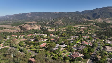 Santa-Barbara-California,-drone-flight-through-the-hills