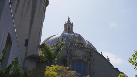 The-magnificent-dome-in-Balboa-Park-rises-gracefully-above-the-surrounding-architecture,-showcasing-the-park’s-blend-of-art,-history,-and-cultural-significance-in-San-Diego