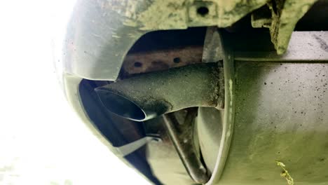 Exhaust-fumes-coming-out-of-the-car's-exhaust-pipe,-Environment-pollution