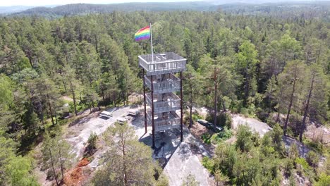 Wooden-observation-tower-with-a-rainbow-flag