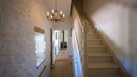 Slow-motion-shot-of-a-staircase-inside-a-antique-stone-villa-in-Uzes