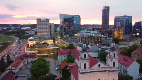 Twilight-cityscape-of-Vilnius,-showcasing-its-mix-of-historic-and-modern-architecture