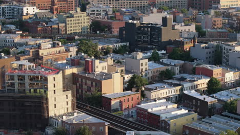 Drone-shot-of-Bedford-Stuyvesant,-Brooklyn-on-a-summer-morning